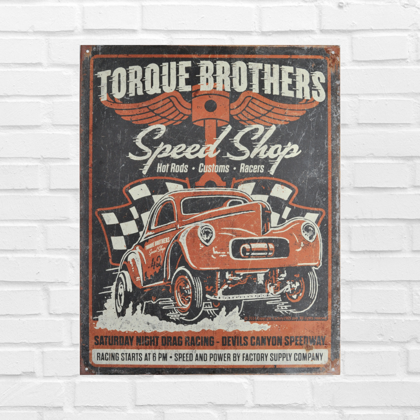 Vintage Poster Print that says "Torque Brothers Speed Shop" and a classic car in front in orange with a distressed design.