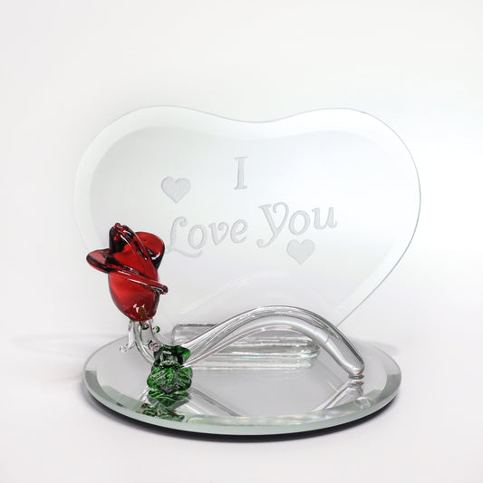 Crystal Castle Heart Shaped Glass plaque with glass rose and mirror base. The words " I love you" are engraved on the glass heart.