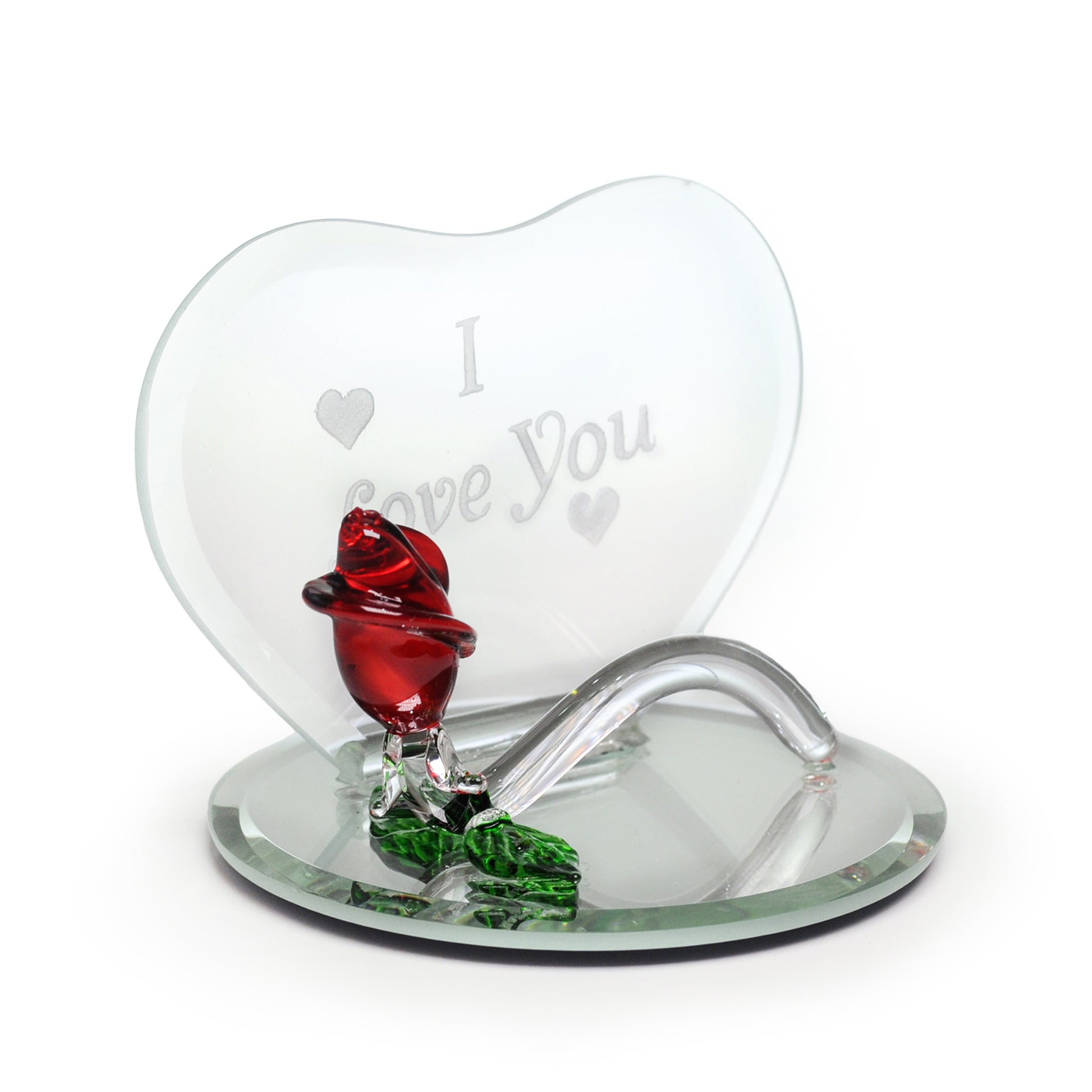 Crystal Castle Heart Shaped Glass plaque with glass rose and mirror base. The words " I love you" are engraved on the glass heart. Side view.